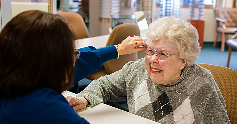 Patient trying on a pair of eyeglasses